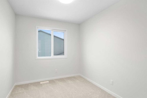 107 Royston Way Nw, Calgary, AB - Indoor Photo Showing Other Room