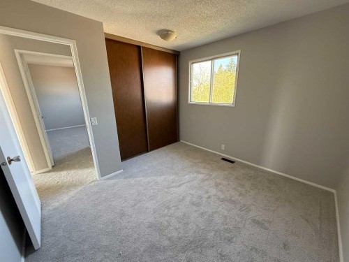 74 Aberdare Way Ne, Calgary, AB - Indoor Photo Showing Other Room