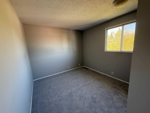 74 Aberdare Way Ne, Calgary, AB - Indoor Photo Showing Other Room