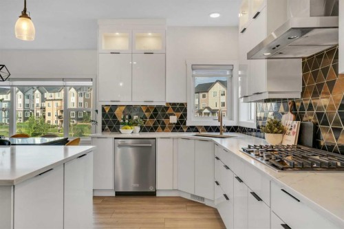 1315 Bayside Drive Sw, Airdrie, AB - Indoor Photo Showing Kitchen With Upgraded Kitchen