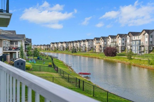 1315 Bayside Drive Sw, Airdrie, AB - Outdoor With Body Of Water With Balcony