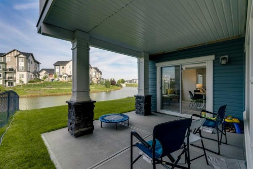 1315 Bayside Drive Sw, Airdrie, AB - Outdoor With Body Of Water With Exterior