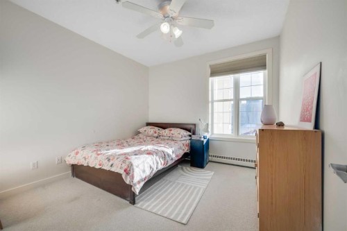 301-208 Holy Cross Lane Sw, Calgary, AB - Indoor Photo Showing Bedroom