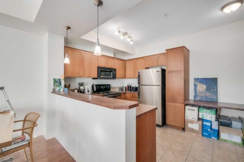 301-208 Holy Cross Lane Sw, Calgary, AB - Indoor Photo Showing Kitchen