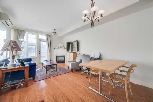 301-208 Holy Cross Lane Sw, Calgary, AB - Indoor With Fireplace