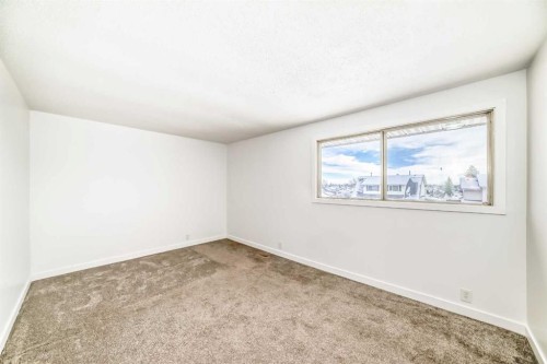 51A Fonda Green Se, Calgary, AB - Indoor Photo Showing Other Room