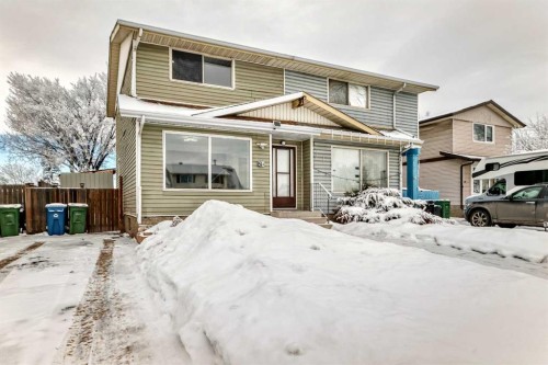51A Fonda Green Se, Calgary, AB - Outdoor With Facade