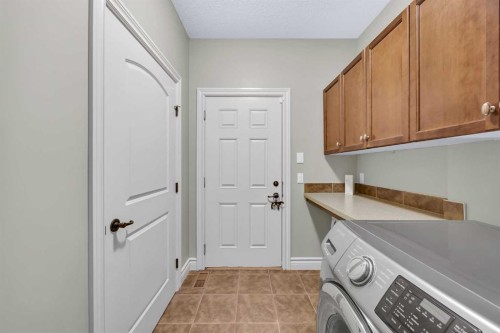 106 Cranleigh Terrace Se, Calgary, AB - Indoor Photo Showing Laundry Room