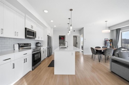 3207-220 Seton Grove Se, Calgary, AB - Indoor Photo Showing Kitchen With Upgraded Kitchen