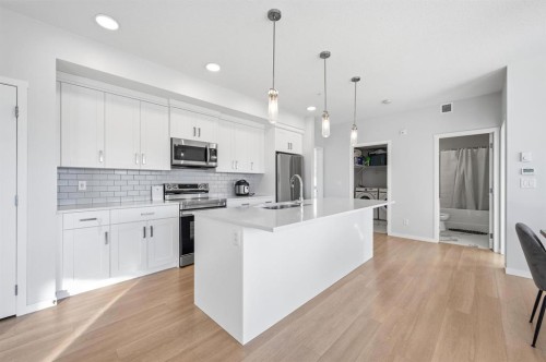 3207-220 Seton Grove Se, Calgary, AB - Indoor Photo Showing Kitchen With Upgraded Kitchen