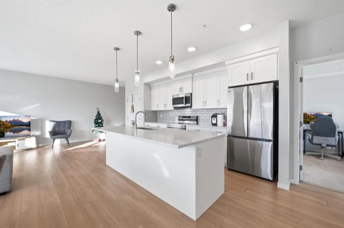 3207-220 Seton Grove Se, Calgary, AB - Indoor Photo Showing Kitchen With Upgraded Kitchen