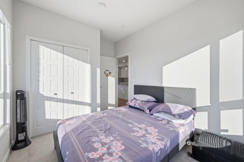 3207-220 Seton Grove Se, Calgary, AB - Indoor Photo Showing Bedroom