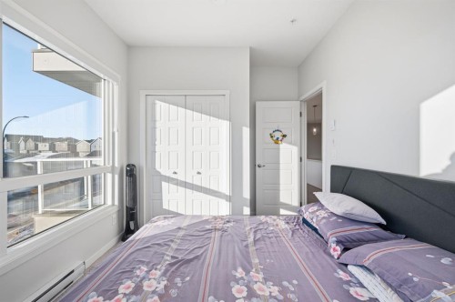 3207-220 Seton Grove Se, Calgary, AB - Indoor Photo Showing Bedroom
