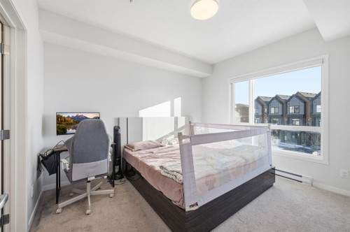 3207-220 Seton Grove Se, Calgary, AB - Indoor Photo Showing Bedroom