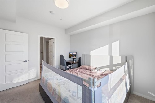 3207-220 Seton Grove Se, Calgary, AB - Indoor Photo Showing Bedroom