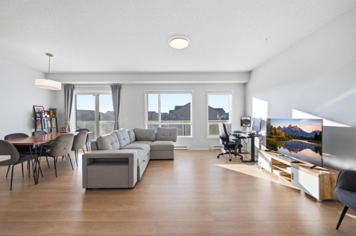 3207-220 Seton Grove Se, Calgary, AB - Indoor Photo Showing Living Room