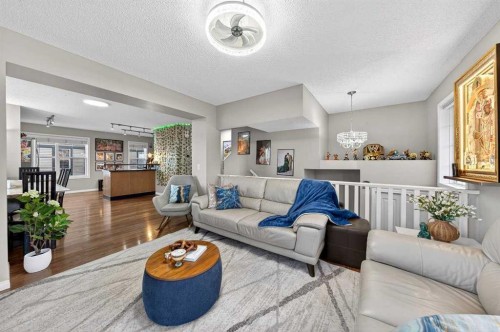 303 New Brighton Villas Se, Calgary, AB - Indoor Photo Showing Living Room