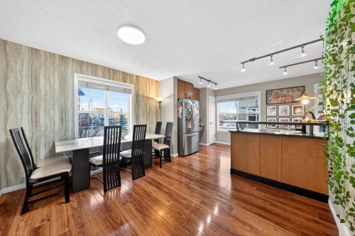 303 New Brighton Villas Se, Calgary, AB - Indoor Photo Showing Dining Room