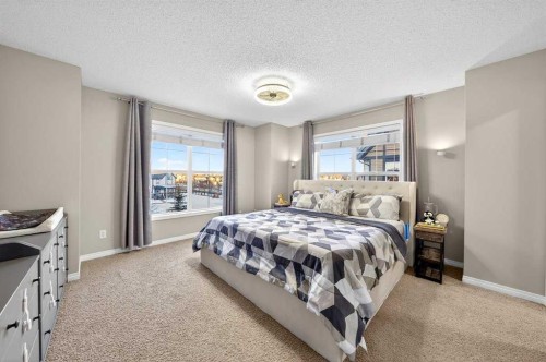 303 New Brighton Villas Se, Calgary, AB - Indoor Photo Showing Bedroom