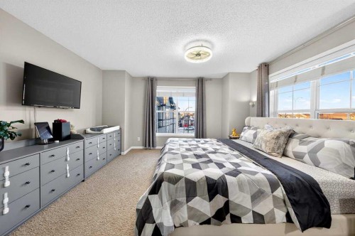 303 New Brighton Villas Se, Calgary, AB - Indoor Photo Showing Bedroom