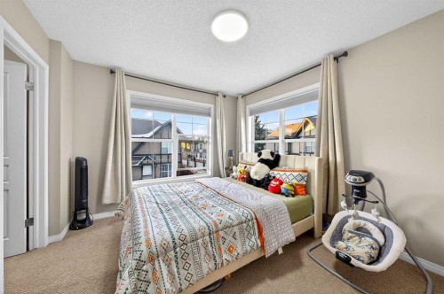 303 New Brighton Villas Se, Calgary, AB - Indoor Photo Showing Bedroom