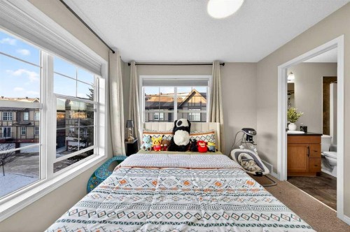 303 New Brighton Villas Se, Calgary, AB - Indoor Photo Showing Bedroom