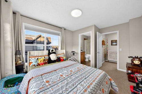 303 New Brighton Villas Se, Calgary, AB - Indoor Photo Showing Bedroom