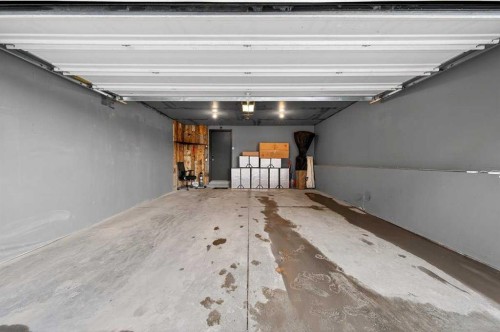 303 New Brighton Villas Se, Calgary, AB - Indoor Photo Showing Garage