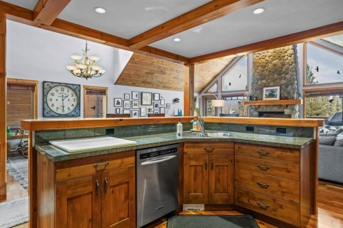 107-210 Hubman Landing, Canmore, AB - Indoor Photo Showing Kitchen With Double Sink