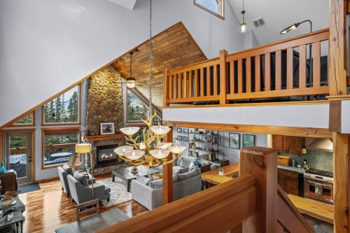 107-210 Hubman Landing, Canmore, AB - Indoor With Fireplace