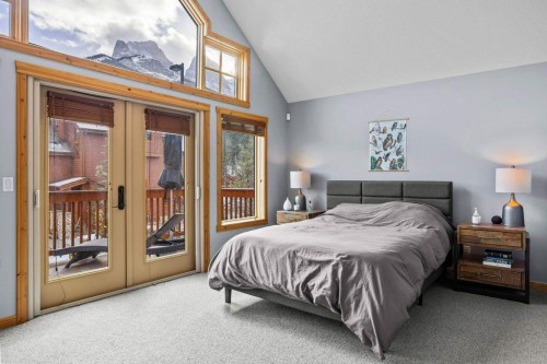 107-210 Hubman Landing, Canmore, AB - Indoor Photo Showing Bedroom