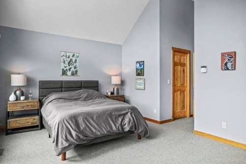 107-210 Hubman Landing, Canmore, AB - Indoor Photo Showing Bedroom