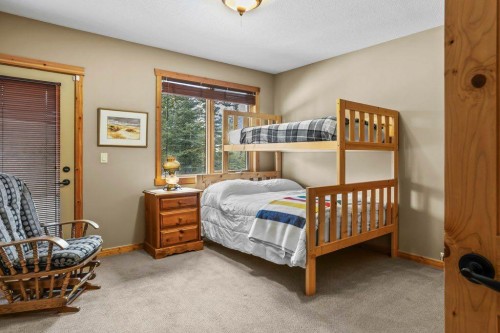 107-210 Hubman Landing, Canmore, AB - Indoor Photo Showing Bedroom