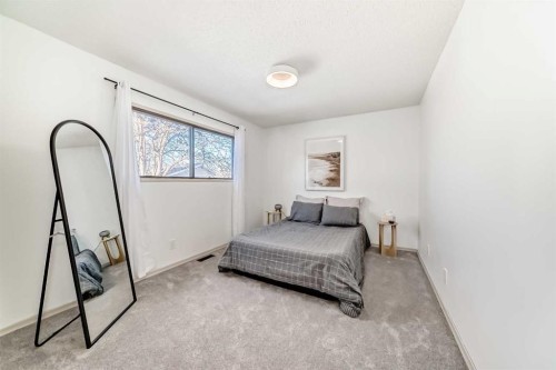 16 Bermondsey Crescent Nw, Calgary, AB - Indoor Photo Showing Bedroom