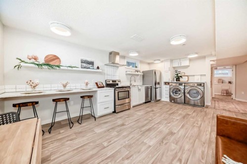 16 Bermondsey Crescent Nw, Calgary, AB - Indoor Photo Showing Laundry Room