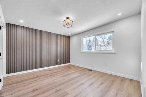 128 Cantrell Place Sw, Calgary, AB - Indoor Photo Showing Other Room