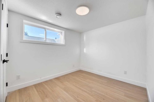 128 Cantrell Place Sw, Calgary, AB - Indoor Photo Showing Other Room