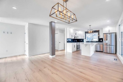 128 Cantrell Place Sw, Calgary, AB - Indoor Photo Showing Kitchen With Stainless Steel Kitchen