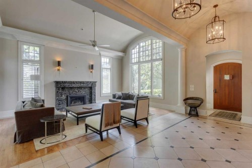 2704 Montcalm Crescent Sw, Calgary, AB - Indoor Photo Showing Living Room With Fireplace