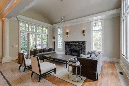 2704 Montcalm Crescent Sw, Calgary, AB - Indoor Photo Showing Living Room With Fireplace