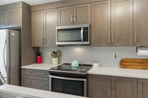 410-338 Seton Circle Se, Calgary, AB - Indoor Photo Showing Kitchen