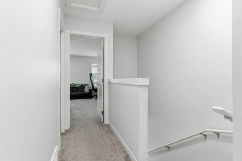 410-338 Seton Circle Se, Calgary, AB - Indoor Photo Showing Other Room