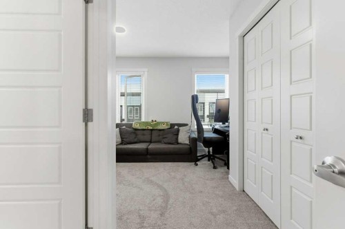 410-338 Seton Circle Se, Calgary, AB - Indoor Photo Showing Other Room