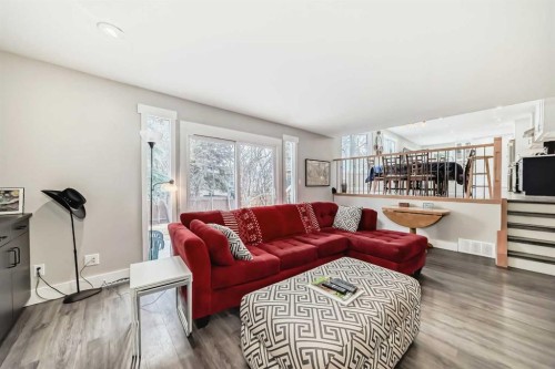 119 Pump Hill Bay Sw, Calgary, AB - Indoor Photo Showing Living Room