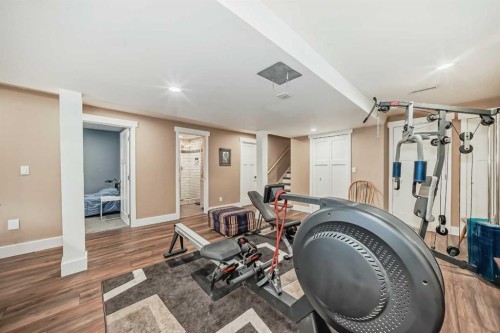 119 Pump Hill Bay Sw, Calgary, AB - Indoor Photo Showing Gym Room