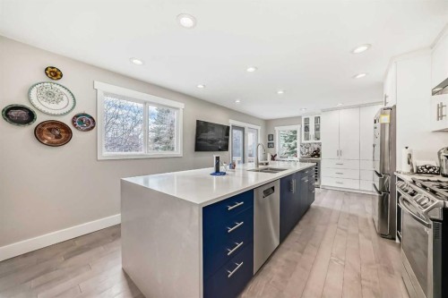 119 Pump Hill Bay Sw, Calgary, AB - Indoor Photo Showing Kitchen With Stainless Steel Kitchen With Double Sink With Upgraded Kitchen