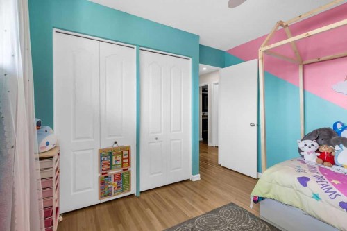 1215 Mapleglade Place Se, Calgary, AB - Indoor Photo Showing Bedroom