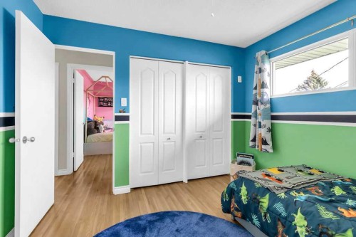 1215 Mapleglade Place Se, Calgary, AB - Indoor Photo Showing Bedroom