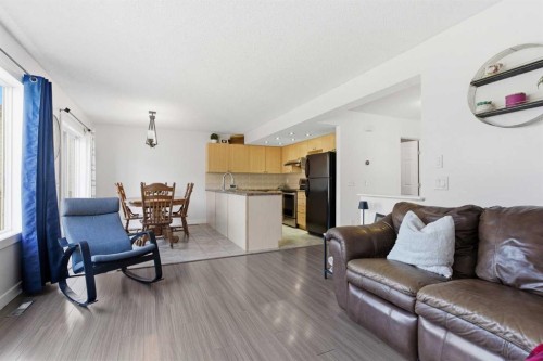 74 Evansbrooke Way Nw, Calgary, AB - Indoor Photo Showing Living Room