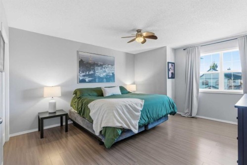 74 Evansbrooke Way Nw, Calgary, AB - Indoor Photo Showing Bedroom